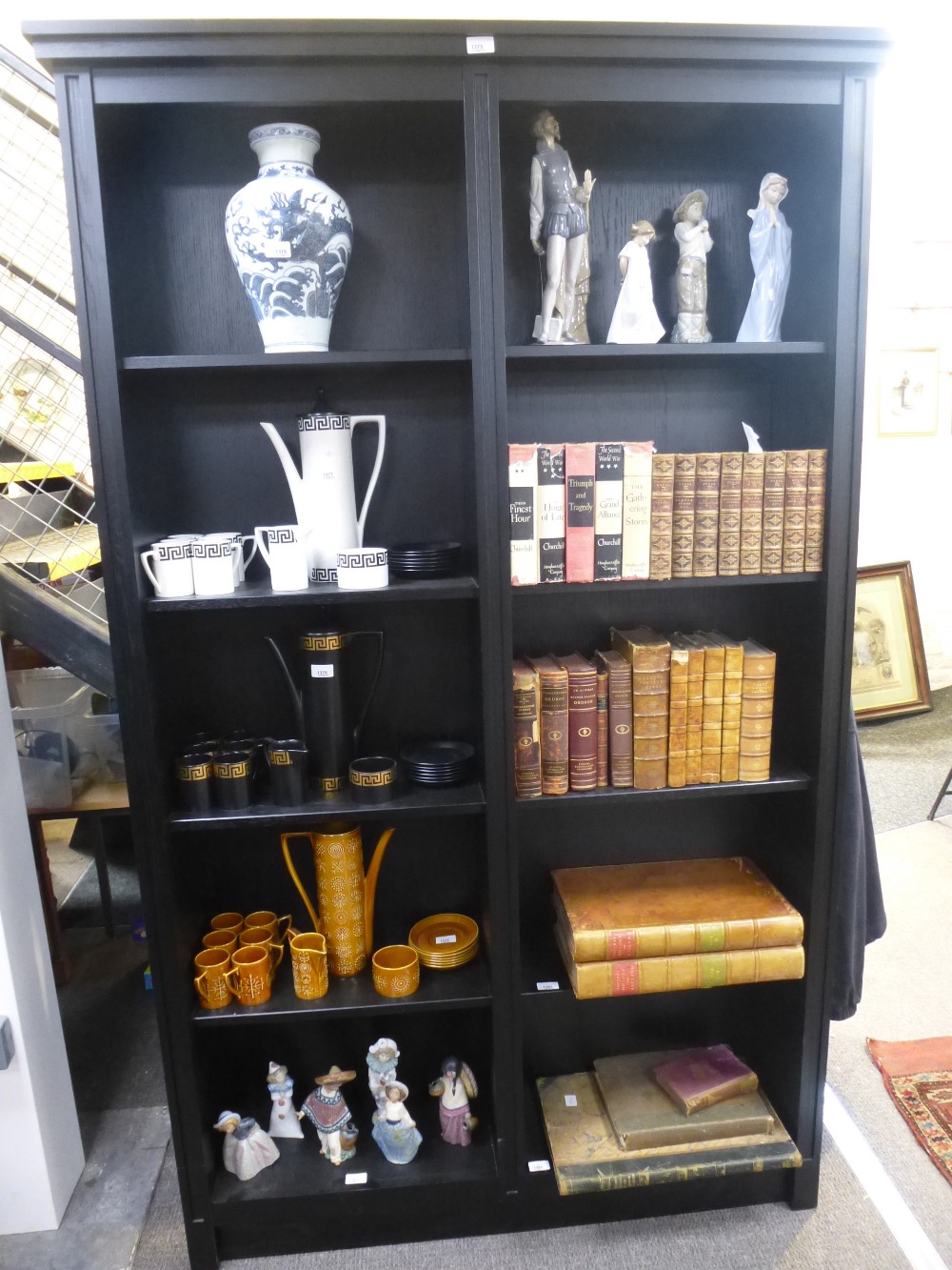 A Modern black oak style open bookcase with 10 shelves 126cms