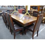 An African hardwood refectory table 200cms and a set of eight matching dining chairs