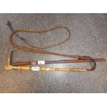 A Fletchers of London riding whip with silver hallmarked collar and faux bamboo shaft, antler grip