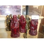 Six Oriental figures formed from resin