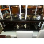 Lacquered Oriental table with depictions of various scenes in mother of pearl