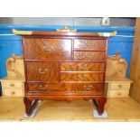 Oriental bank of 7 drawers with brass handles