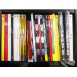 A shelf of Ferrari Official year books from 1992 onwards and other Ferrari books