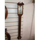 A Georgian style inlaid mahogany stick barometer 94cms