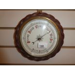 A Rope twist aneroid barometer 22cms