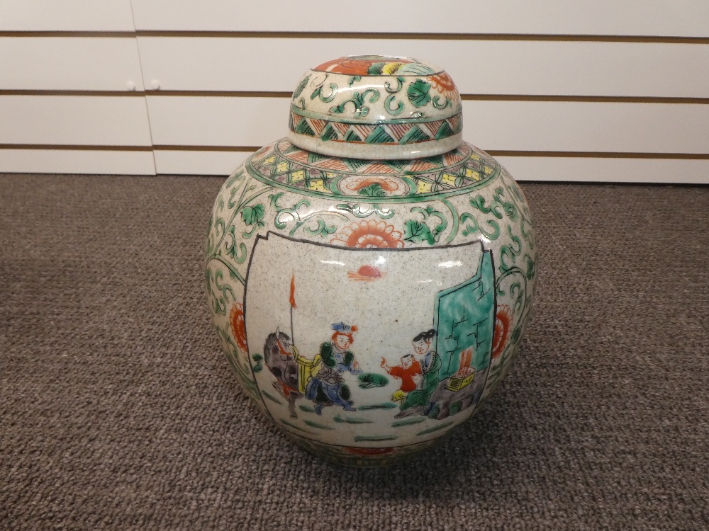 Chinese Famille Verte ginger jar and cover having panels decorated figures, 28cm