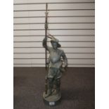 Old spelter oil lamp in the form cavalier holding a lance. 76cm