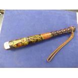 A wooden truncheon: decorated with a coat of arms printed above G R and 'Constable' with a lower