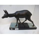 Irene Rochard- French Art Deco; spelter model of a deer mounted on a stepped marble base, 33cm long,