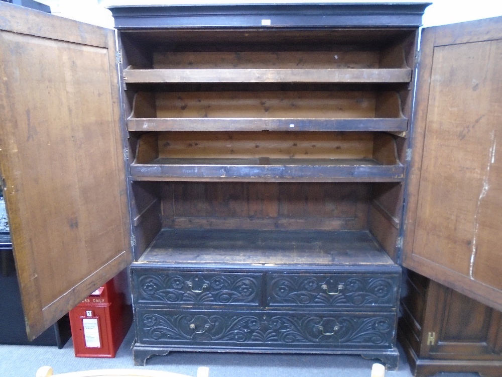 A late 19th century carved oak linen press with two short and one long drawer, 152cms - Image 2 of 2