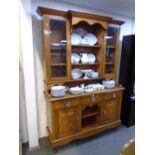 A Continental possibly Swedish kitchen dresser with glazed top and open shelves 160cms