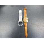 Gents vintage Rotary wristwatch, brass case and tan leather strap and a Seiko Quartz stainless steel