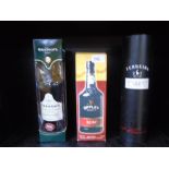 A bottle of Ferreira 1997 Vintage port and 2 others