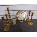 Assorted Brassware comprising of 5 candlicks, carriage clock and a nautical style clock