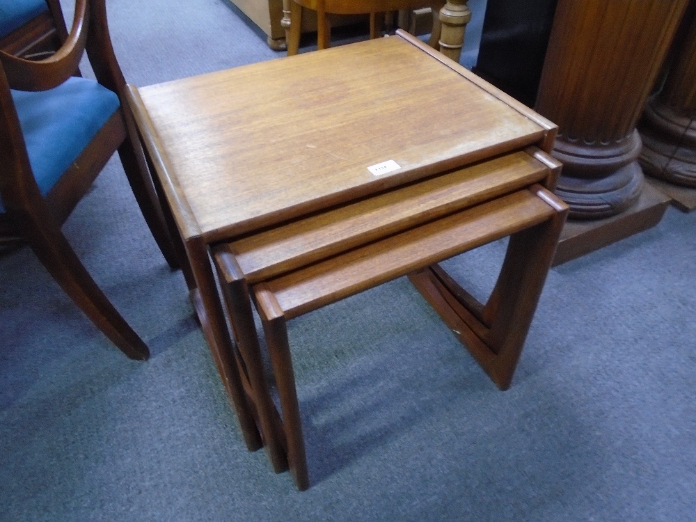 N of 3 1970s teak coffee tables, 53cm