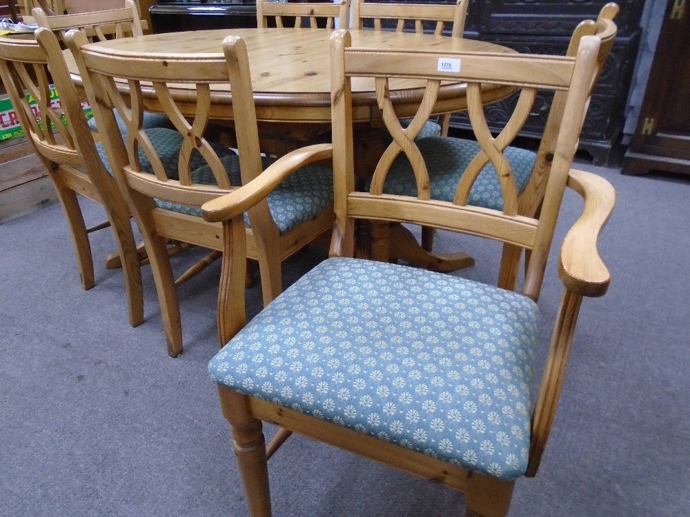 A Ducal pine oval dining table with concelled leaf and a set of eight Ducal dining chairs to include - Image 3 of 3