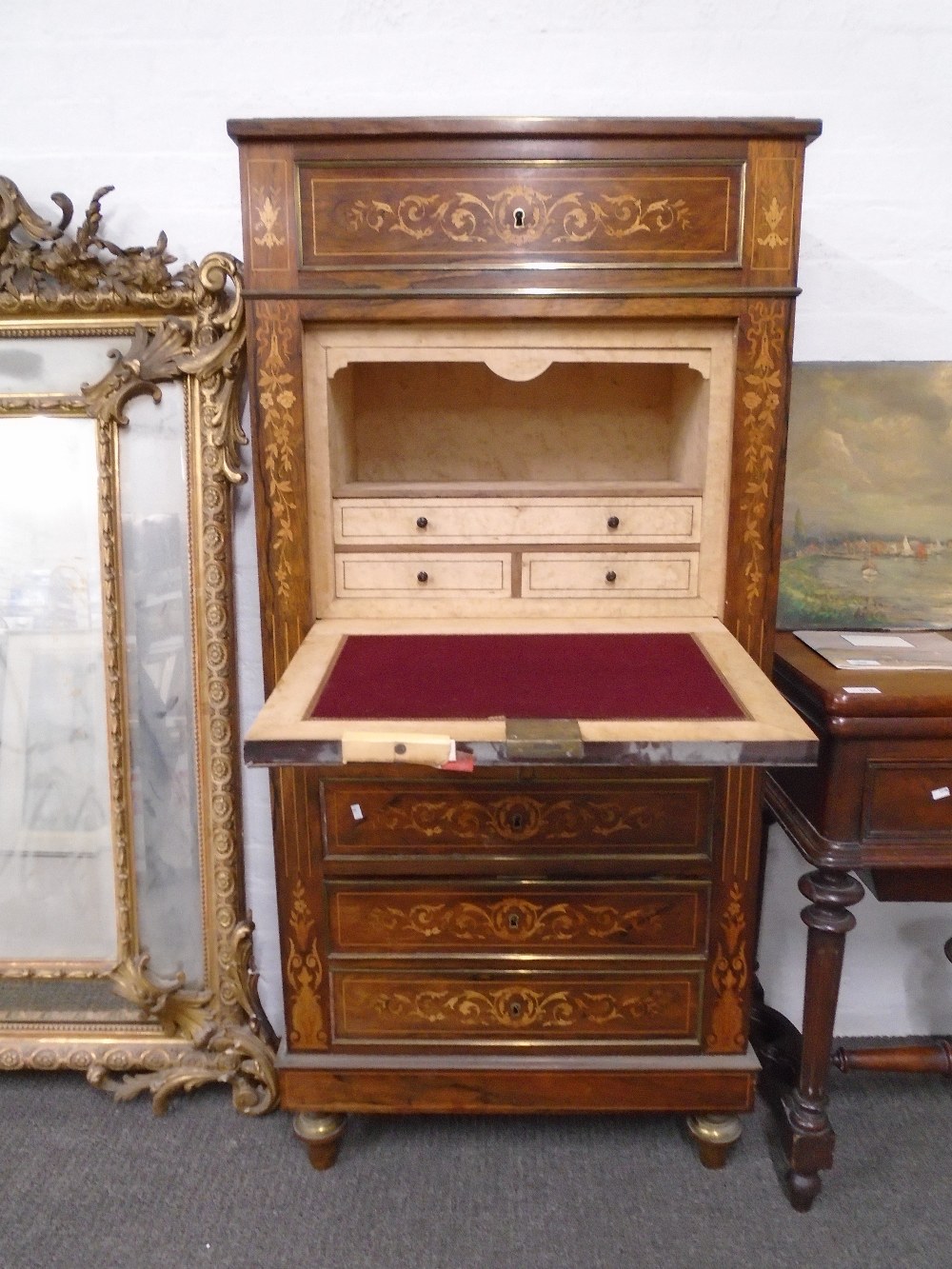 A French 19th century rosewood and brass mounted Secretaire a Abattant with marble top and inlaid