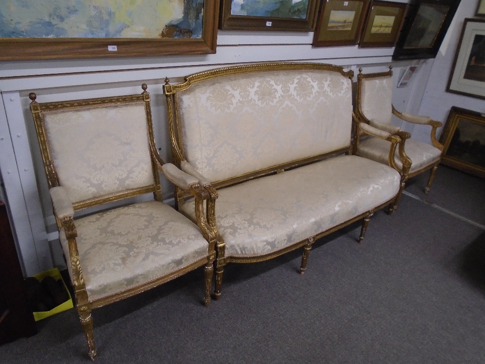 Pair of French 19th Century giltwood open armchairs and similar settee