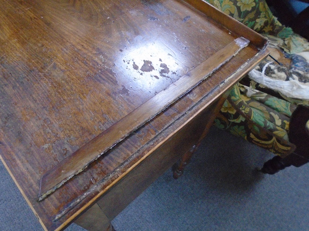 An antique mahogany writing table with five drawers with rosewood inlaid panels on turned legs, - Image 3 of 3