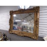Large modern gilt frame mirror with ornate frame