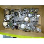 Box of vintage wristwatches with stainless steel cases and straps