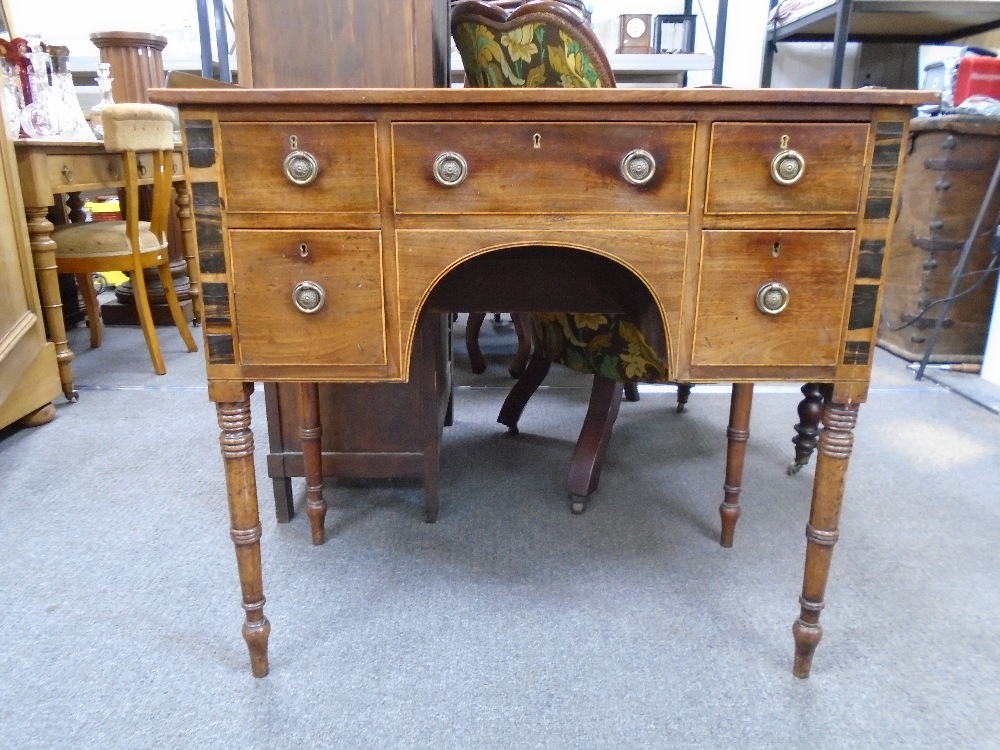 An antique mahogany writing table with five drawers with rosewood inlaid panels on turned legs, - Image 2 of 3