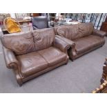 Two and three seat brown leather sofa