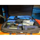 Suitcase containing deep sea fishing equipment incl. Shark hooks etc