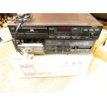 A Memorex compact disc player CD - 5300 with a Sony tape player TC - FX210 and a NED cassette deck