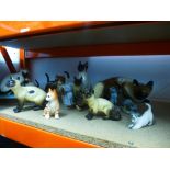 Large collection of ceramic model cats including coppercraft, Kensington high bank examples, some