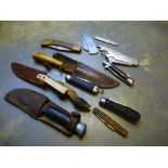 A quantity of vintage pen knives, including a military example