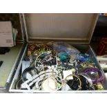 Aluminium case containing costume jewellery