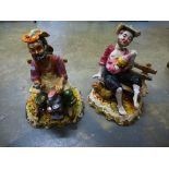 Two Capodimonte figures seated