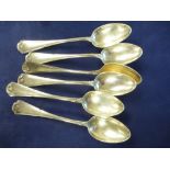 Set of 6 continental white coloured metal teaspoons with stylised leaf pattern handles, marked to