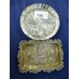 A Birmingham silver embossed pin dish, 1862 and an oblong silver pin tray with pierced border