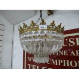 A glass bag chandelier, having pendant drops, 32cms