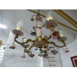 A five branch chandelier having china floral drops and a glass Yard of Ale