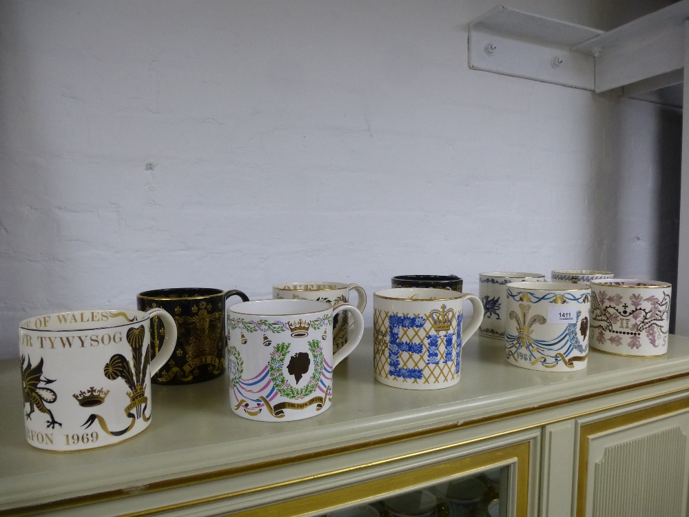 Ten Wedgwood commemorative mugs designed by Richard Gayott some limited editions.