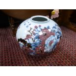 A large Oriental bulbous vase decorated with flowers 36cms