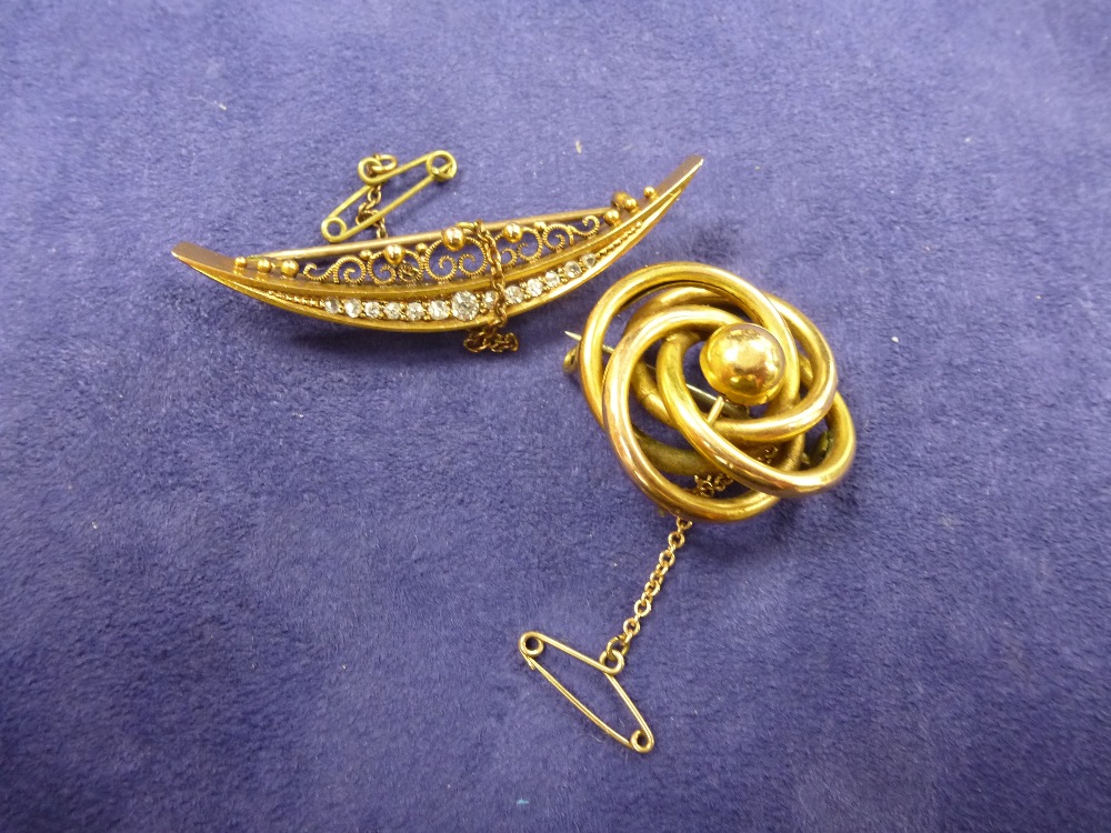 Edwardian yellow coloured metal crescent style brooch set with diamonds, unmarked, 4.5g, together