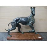 Bronze sculpture of a greyhound on a rouge marble base, unsigned 47.5cm