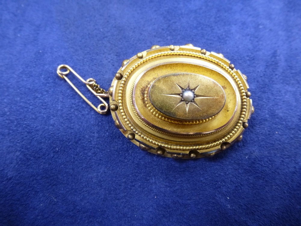 Victorian oval yellow coloured metal mourning brooch with beaded, seed pearl to centre, braided