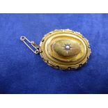 Victorian oval yellow coloured metal mourning brooch with beaded, seed pearl to centre, braided