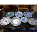 A quantity of pottery plates and others.