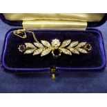 Late 19th Early 20th white and yellow coloured metal leaf design bar brooch set with diamonds