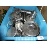 Crate of unusual stainless steel tea and dinnerware