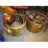 Brass and copperware to include saucepans, kettle, copper measures, bed pan and large couldrons