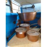 Graduated set of 3 heavy copper saucepans and matching hanging pan