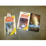 Three vintage paperback Star Wars books