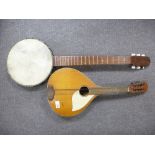 Vintage Rosetti mandolin and a banjo